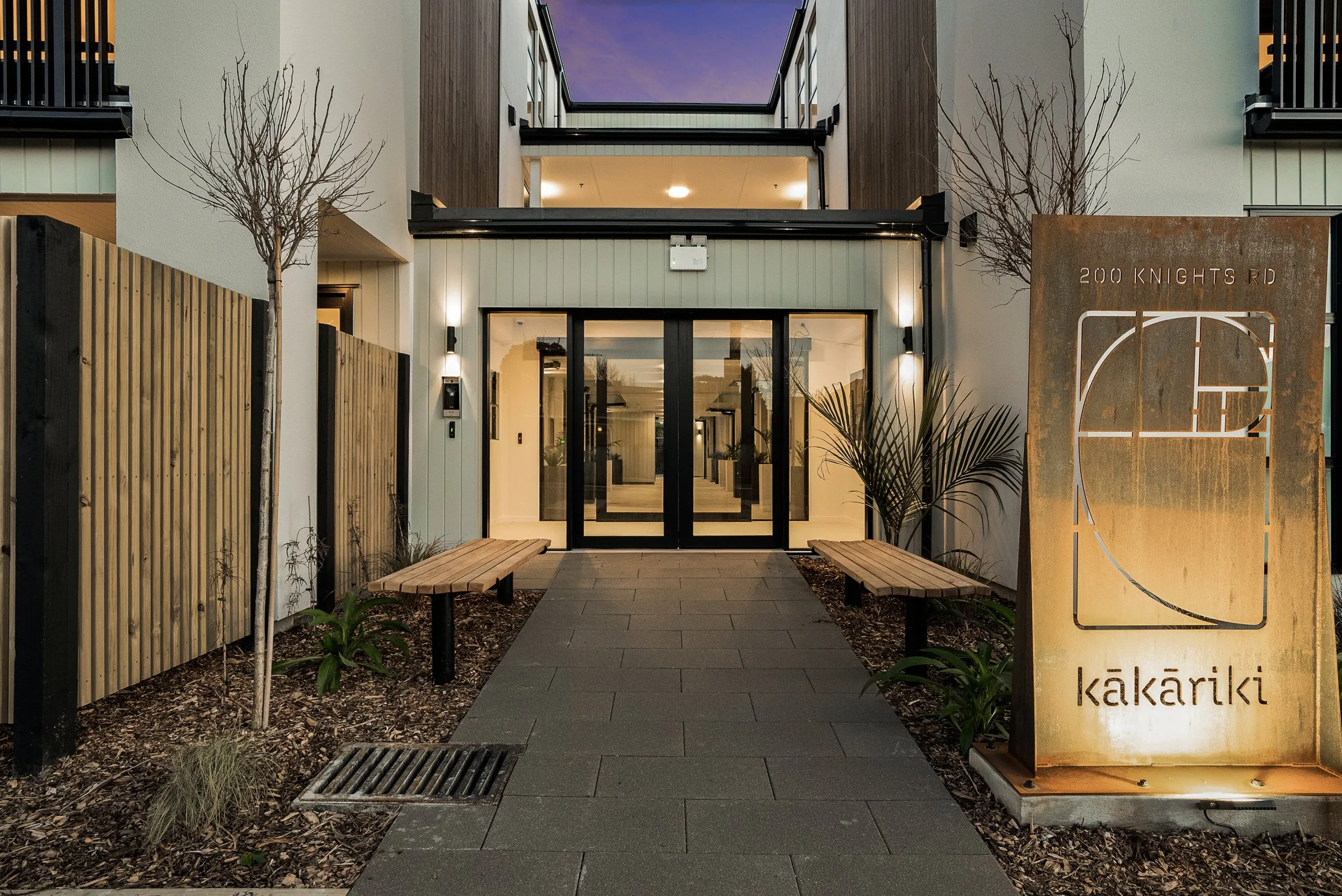 The Kakariki entrance with its corten sign and landscaping