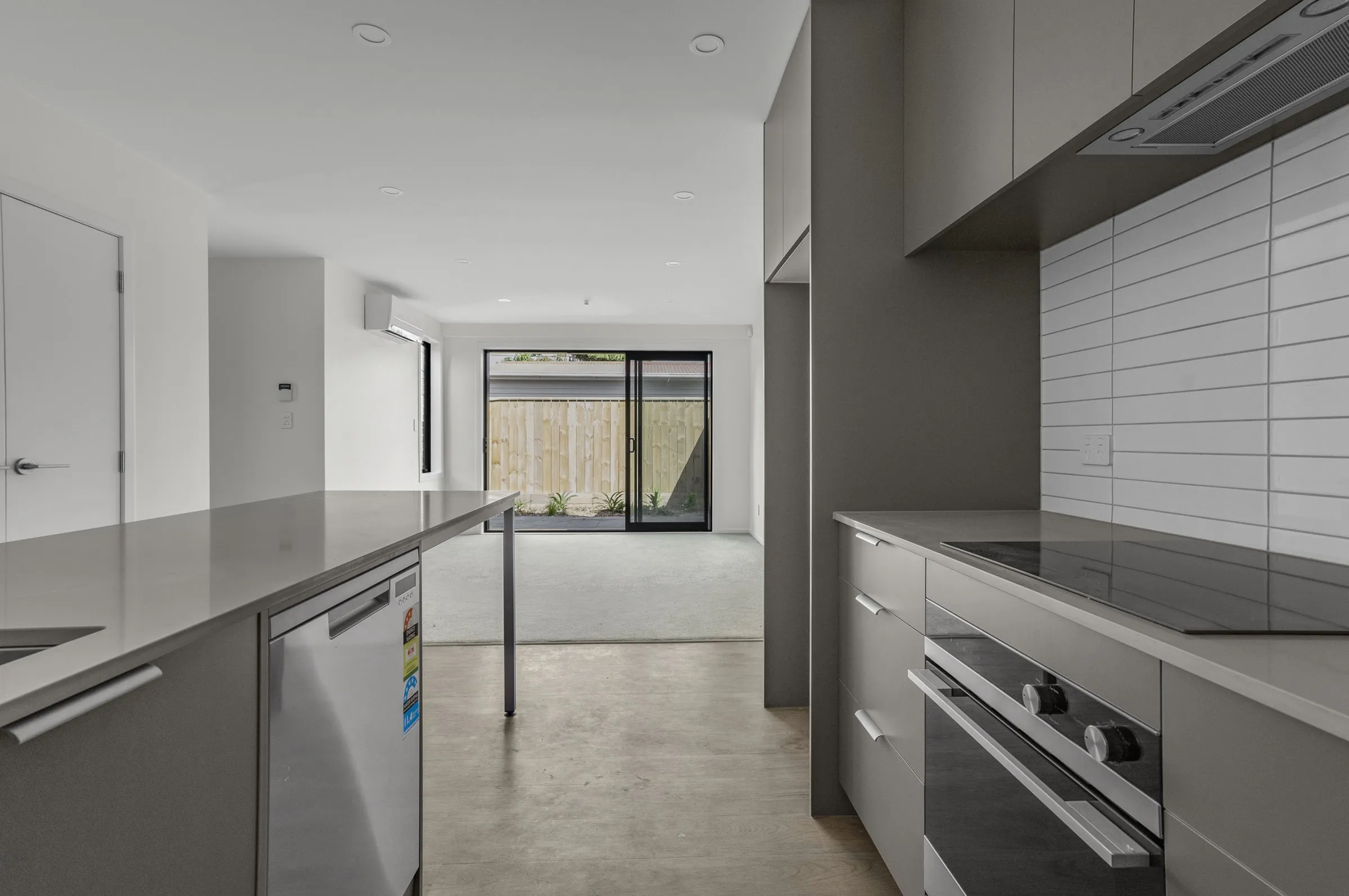 Kitchen with dark cabinetry